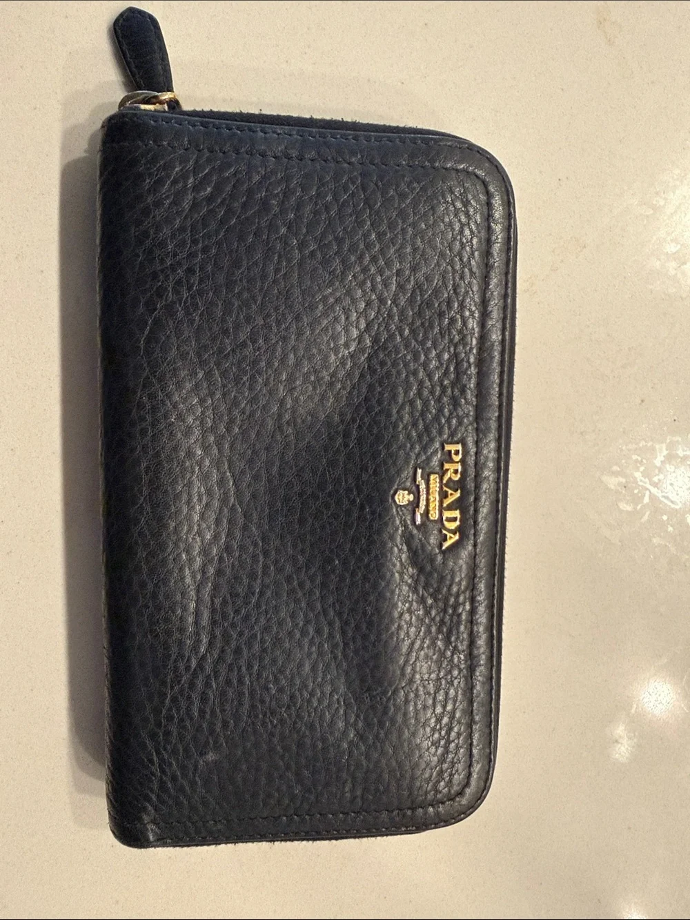 Prada Black Pebbled Leather Zip Wallet with Gold Logo
